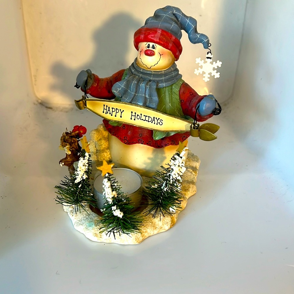 Happy holidays, snowman, tea, light decor.